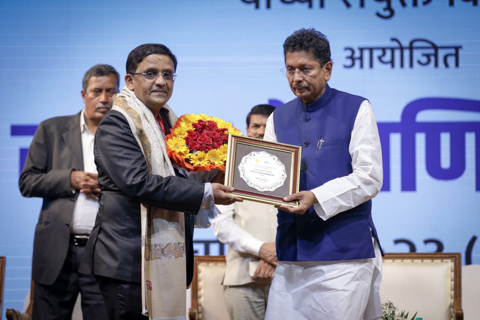 Receiving award from Education Minister Mr. Deepak Kesarkar